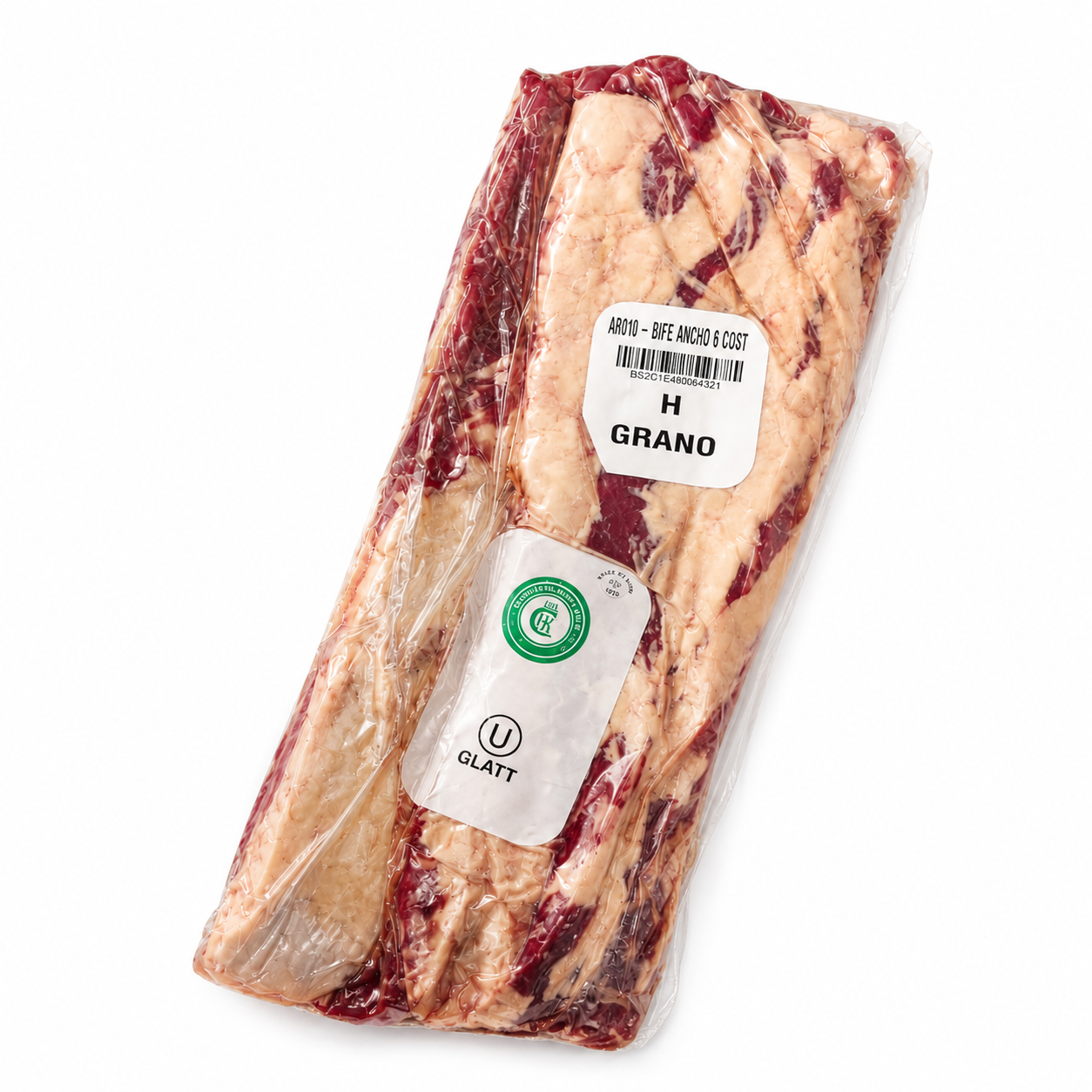 Packaged raw meat ribeye with labels on a white background